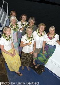 The ship's ladies coming back from a meke.