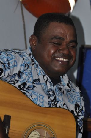 Divemaster Mo singing at the Kava party.