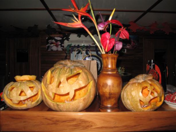 Jack-o-lanterns setting the spooky mood for the halloween party.