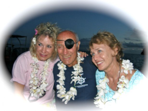 Stan entertaining the ladies after a days diving. At 86 and going strong, a true hero!